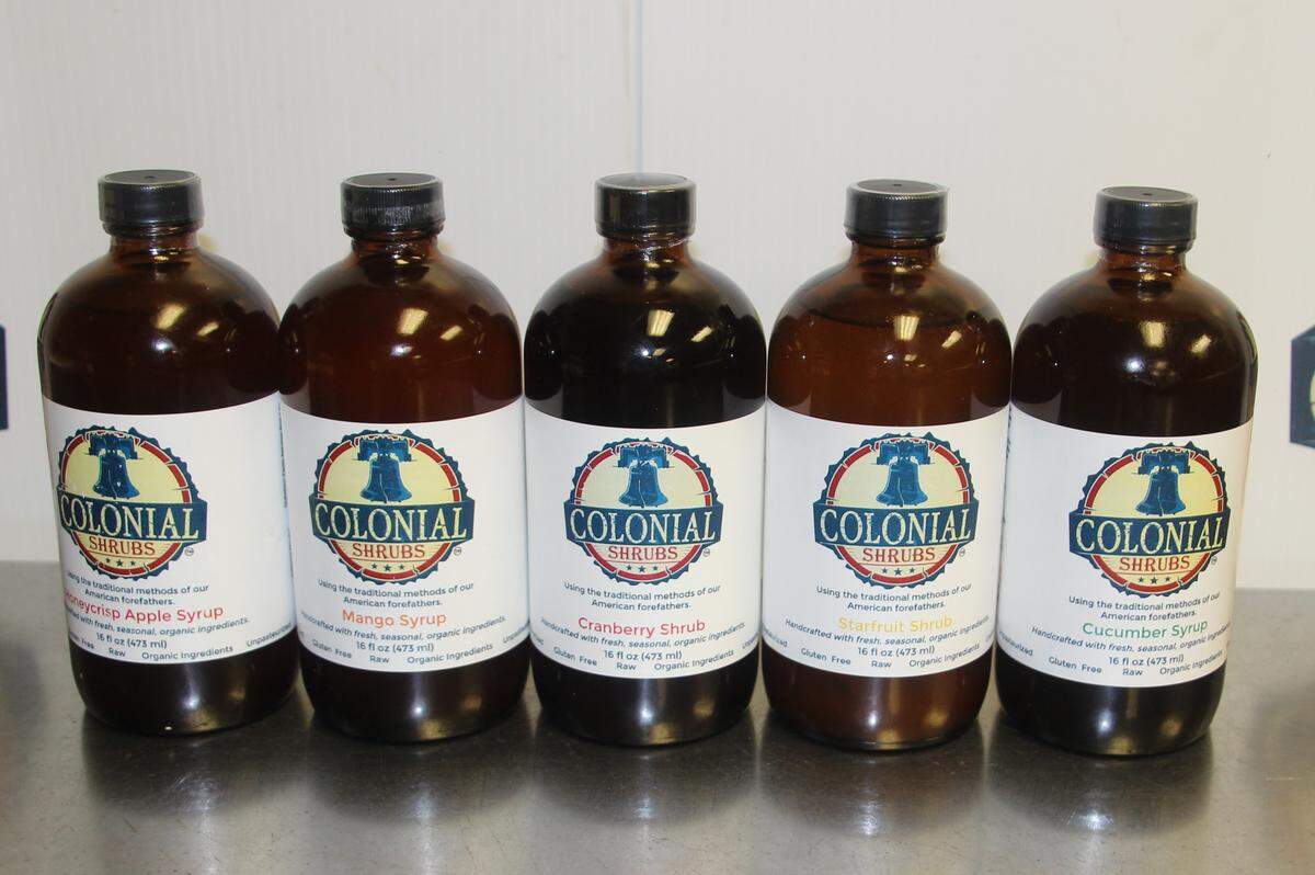 Among  flavors offered by  Colonial Shrubs are honeycrisp apple, mango, cranberry. starfruit and cucumber.