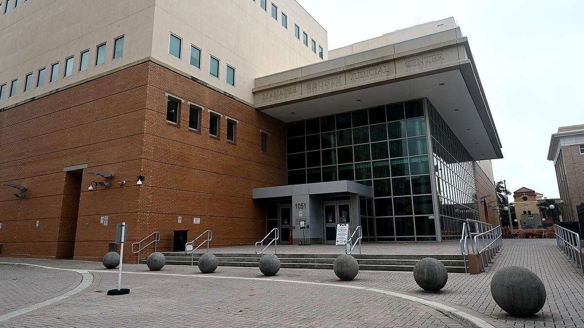 A Georgia man who impersonated a local development company and stole $1.4 million from Manatee County officials pleaded no contest to fraud charges. The Manatee County Judicial Center is pictured on April 3, 2024.