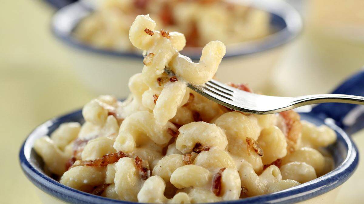 Bacon brings its smoky flavor to an easy stovetop mac and cheese. A trio of Parmesan, mascarpone and ricotta make up the sauce. (Michael Tercha/Chicago Tribune/TNS)