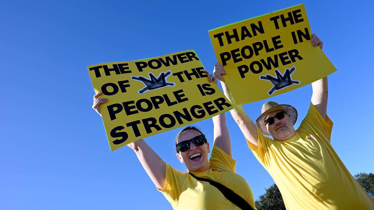 Tirzah and Peter Harper attended the No Kings protest organized by Indivisible Manatee near the University Town Center along University Parkway in Sarasota during one of the hundreds of rallies held across the country on Saturday, Oct. 18, 2025.