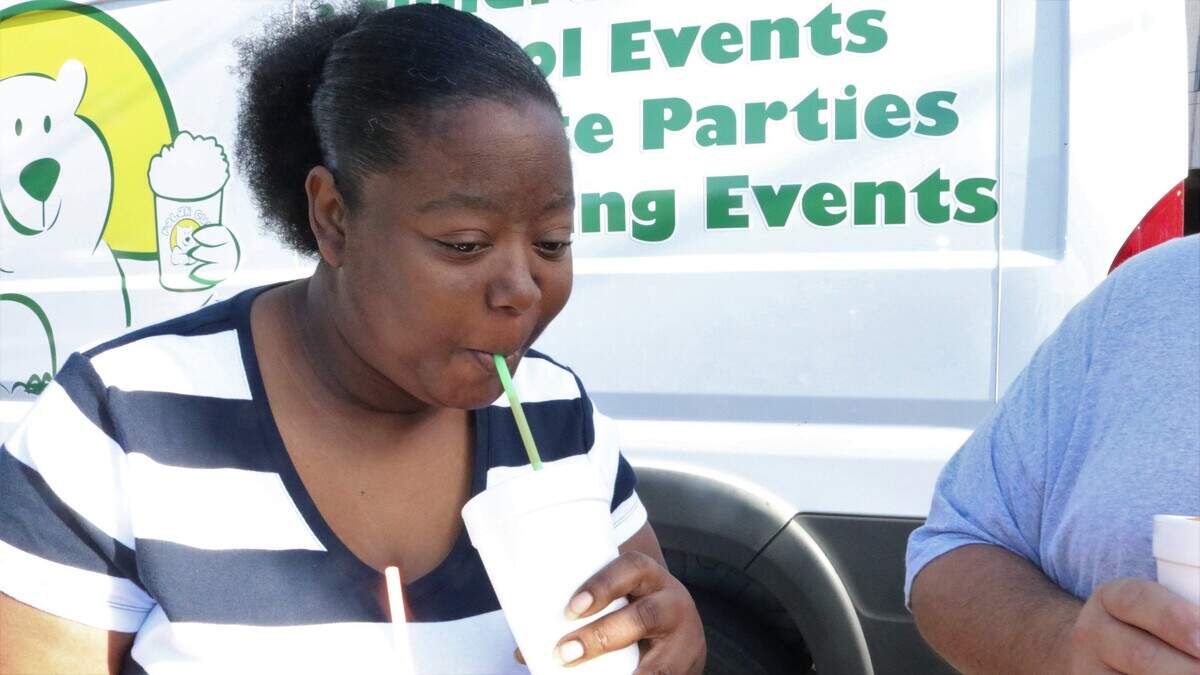 Lakia Earley flashes back to her childhood with a sip of a Polar Cup. The icy treat was a local staple in the 1980s and 1990s, and recently made a return to the Bradenton area.