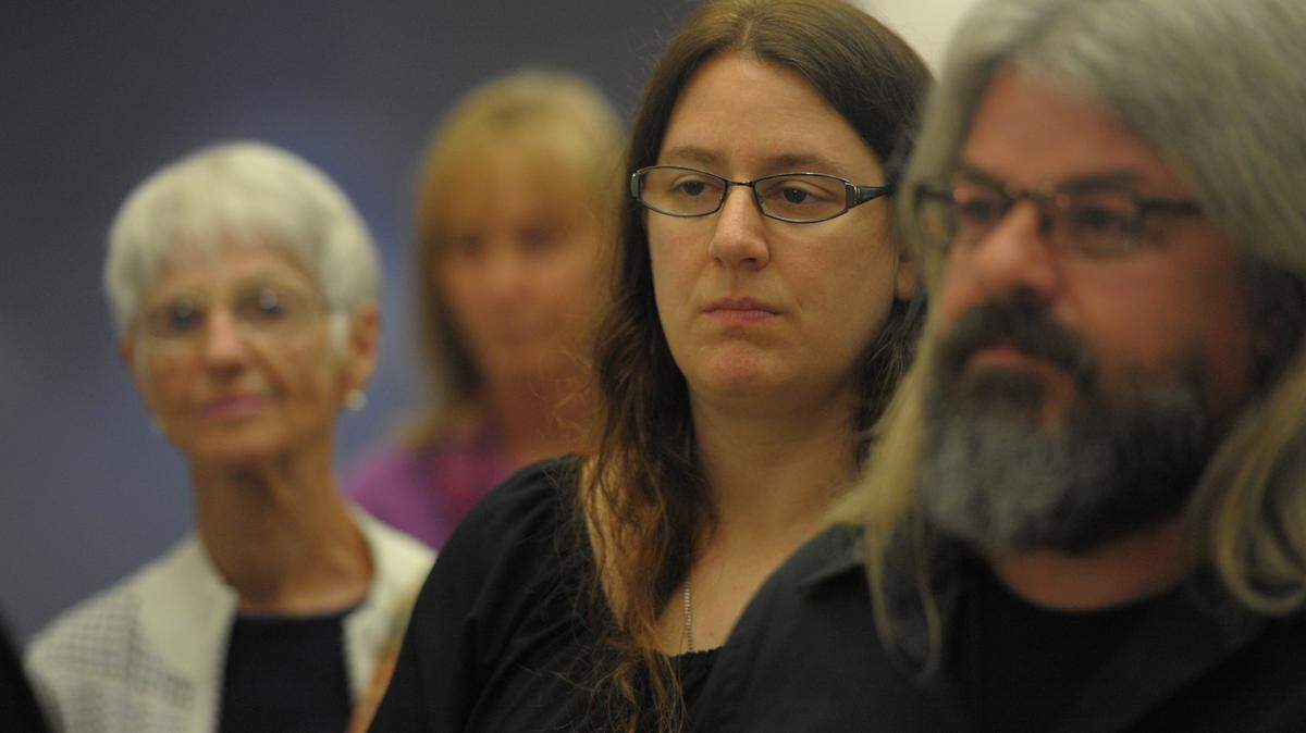 State College of Florida facility members share their dissatisfaction with the the college's board after the board voted on a final draft to end tenure policies at the college despite objection from the school's faculty. 
 GRANT JEFFERIES/Bradenton Herald