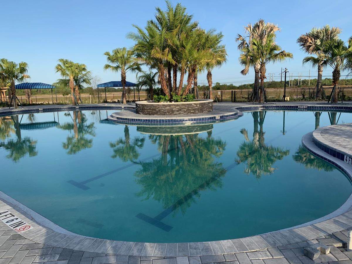 Brightwood Pavillion, a 4,100-square-foot clubhouse at North River Ranch, has a resort-style pool, playground, game room, and fitness center.