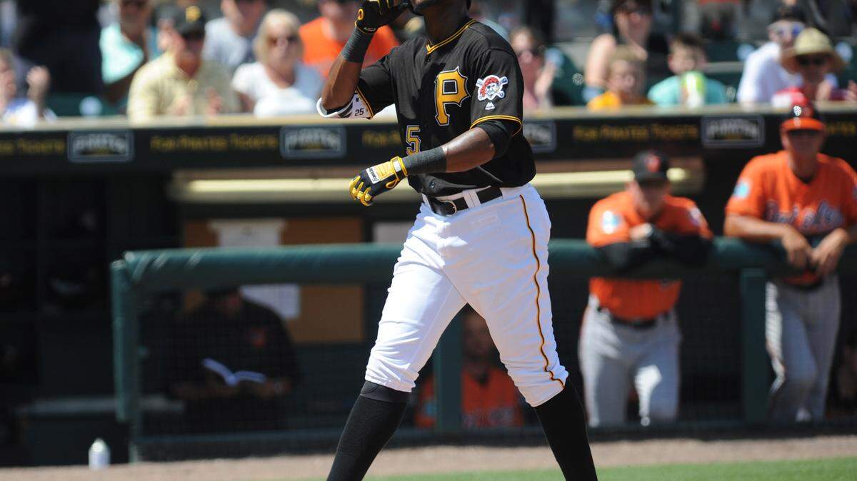 Pittsburgh Pirates' Gregory Polanco looks skyward as he crosses home plate after hitting a home run during a spring training game with the Baltimore Orioles on Wednesday at McKechnie Field in Bradenton. 
 GRANT JEFFERIES/Bradenton Herald