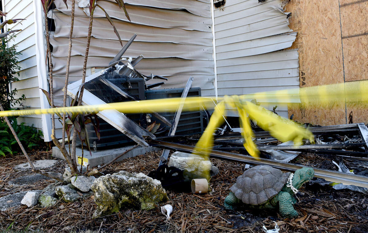 11/09/21—A fire at Aaron Lake apartments in Bradenton on November 6 seriously injured four children and two adults. A small garden turtle sits surrounded by wreckage from the fire.