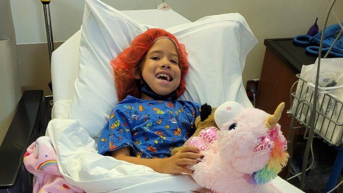 Aubrey Romero, 7, was diagnosed with a rare form of cancer. Her teacher and classmates at Sea Breeze Elementary School have rallied to raise money for her treatment and raise her spirits.