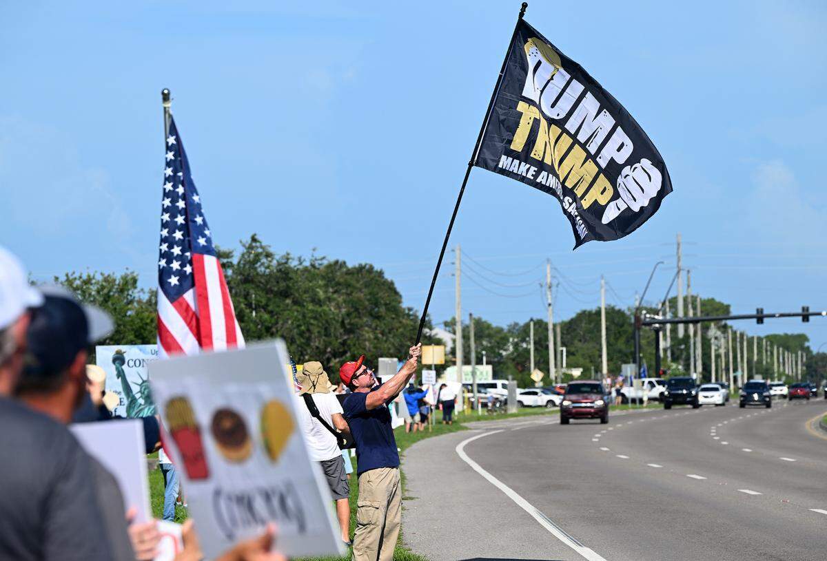 Hundreds attend the No Kings protest organized by Indivisible Manatee near the University Town Center along University Parkway on June 14, 2025.