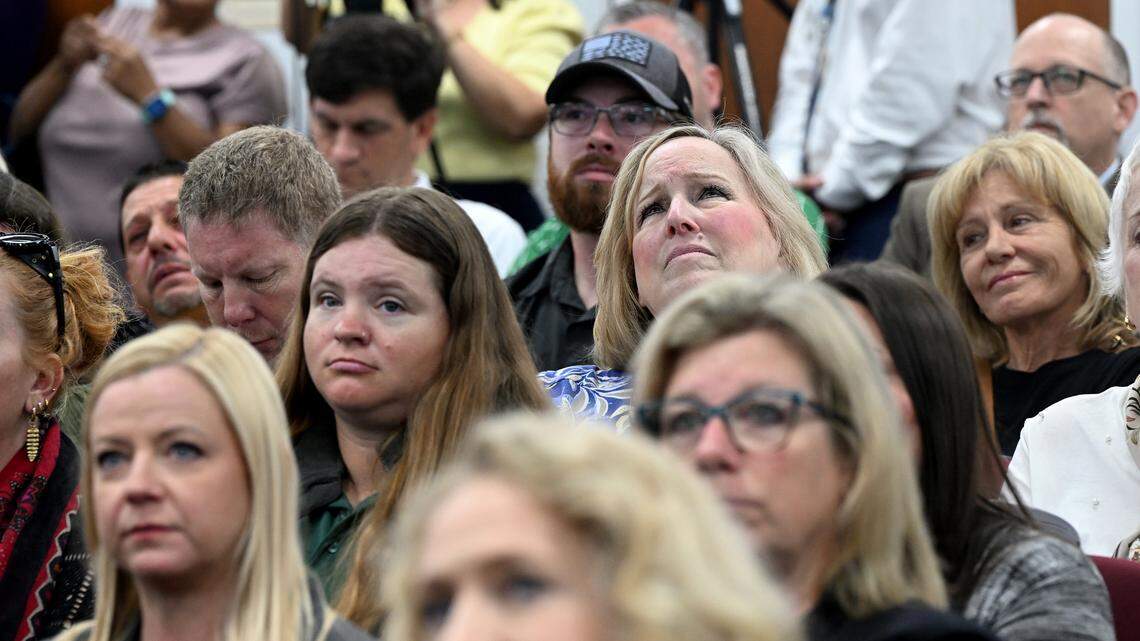 People watch a tribute video at a meeting of the Manatee County Commission during a memorial to Carol Ann Felts on March 3, 2026.