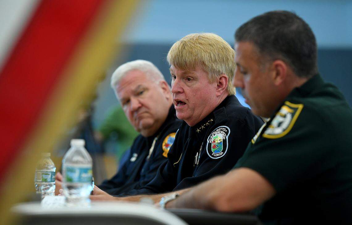 Palmetto Police Chief Scott Tyler (middle) participates in discussion during a law enforcement roundtable hosted by U.S. Vern Buchanan, in this February 2022 Bradenton Herald file photo.