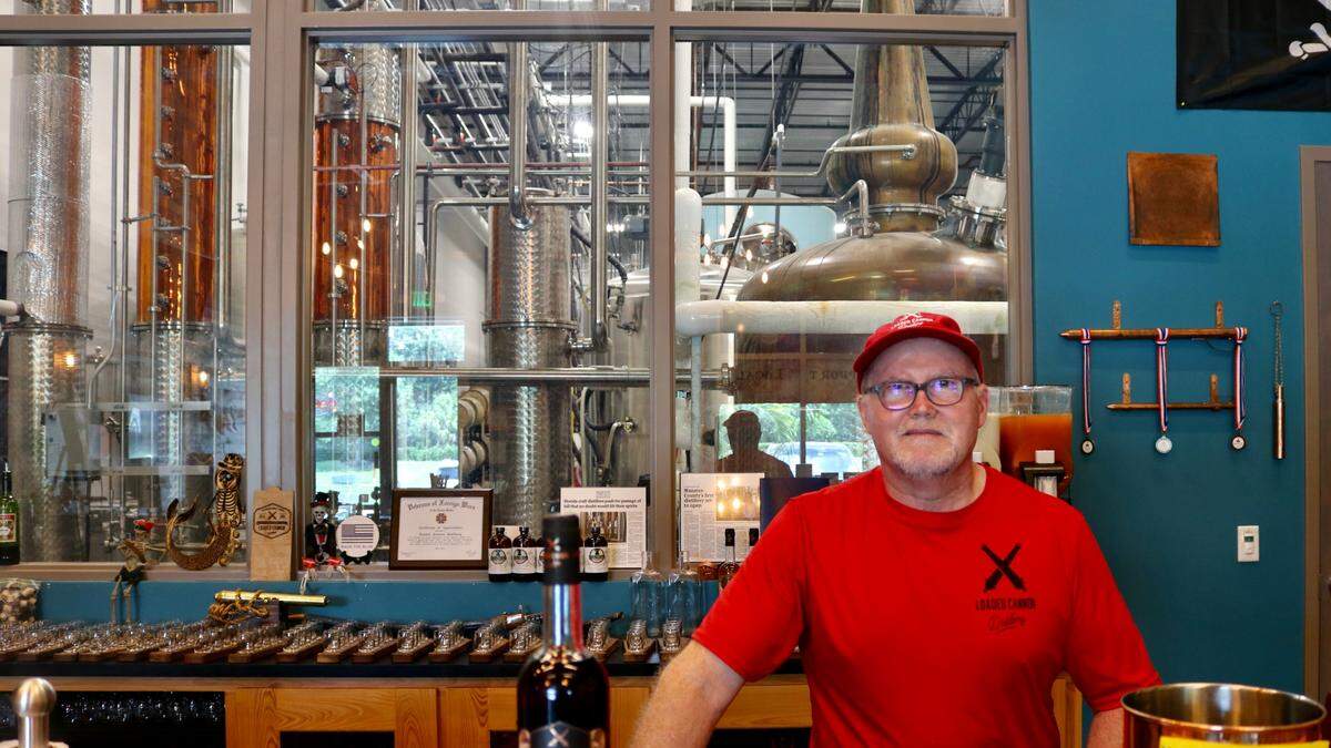 Steve Milligan, founder, president and chief distiller at Loaded Cannon Distillery, Suite 110 of the Gatewood Corporate Center, 3115 Lakewood Ranch Blvd., stands at the bar of the tasting room 6/28/2022.