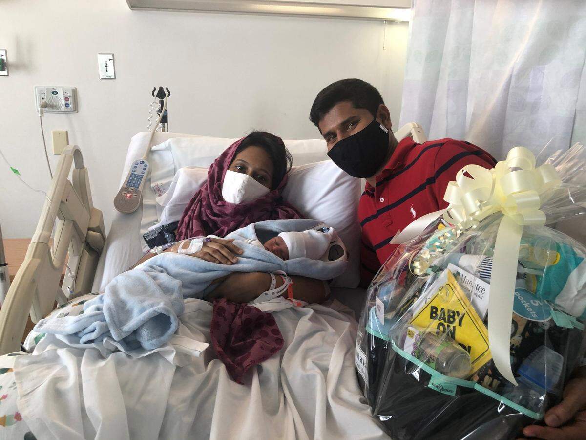 Mom&nbsp;Abida Binte Sanuwa and dad&nbsp;Md Moinuddin show off their new son, Arav Uddin Mayed, the first baby of 2021 born at Manatee Memorial Hospital in Bradenton. Arav was the first of 3,596 babies born in Manatee County in 2021.