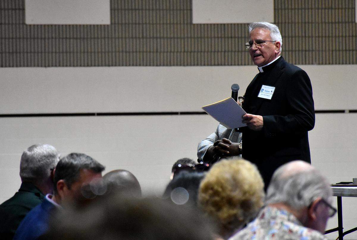 A conglomeration of 15 Manatee County churches joined together to create the Stronger Together Reaching Equality Across Manatee (STREAM) organization, which called on local officials to support policy changes that secure more affordable housing and rethink criminal justice reform. Father Glen Graczyk speaks to nearly 600 people during the group’s Nehemiah Action meeting Monday, April 4, 2022, at Southeast High School.