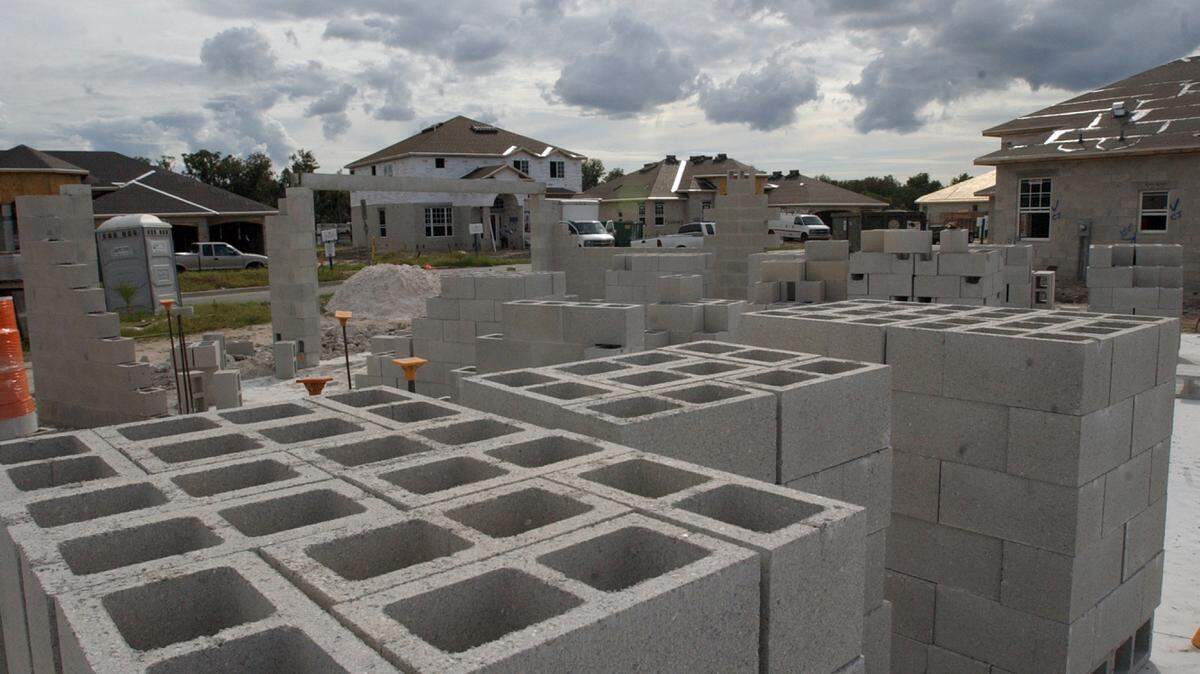 Concrete blocks are piled and ready for building at a Lennar Homes construction site in River Place in this 2005 file photograph. Manatee County officials and school board members are considering reinstating impact fees on new construction to help pay for new schools, roads, and other needs.File Photo-GRANT JEFFERIES/Bradenton Herald