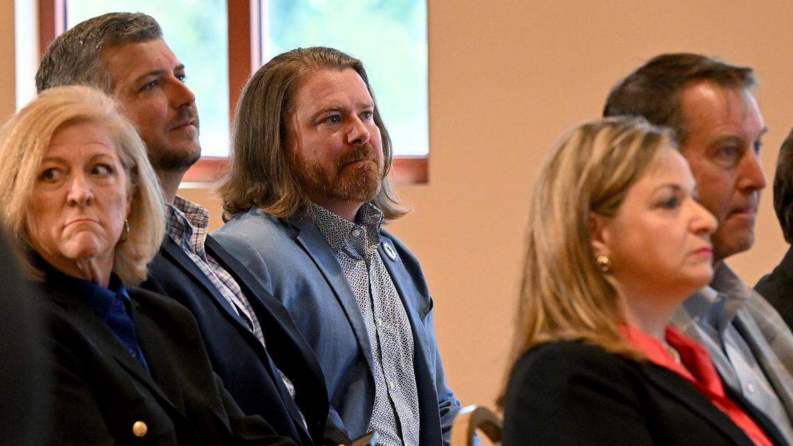 Adam Johnson, third from left, attends a press conference held by Gov. Ron DeSantis in July 2025. Johnson is running for the Manatee County Commission seat currently held by Commissioner Jason Bearden.