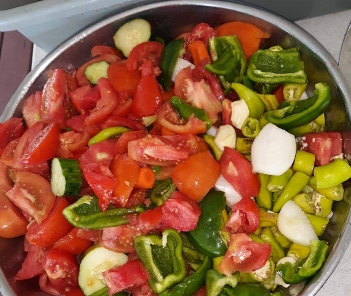 Lovina Eicher and her family have been using fresh garden produce to make into their own vegetable juice.