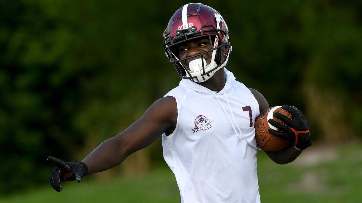 Trayvon Pinder, junior running back at Braden River High, smiles during a play in practice Tuesday, Sept. 13, 2022.