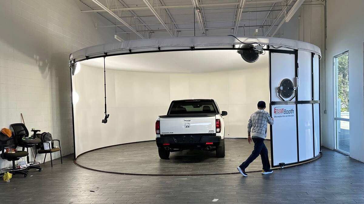 Hanna Cars of Bradenton opens for business this week at 3230 14th St. W. The used-car business specializes in low mileage, late model cars. Shown above is the carousel the company uses to photograph cars in the round, allowing customers to preview cars on online.