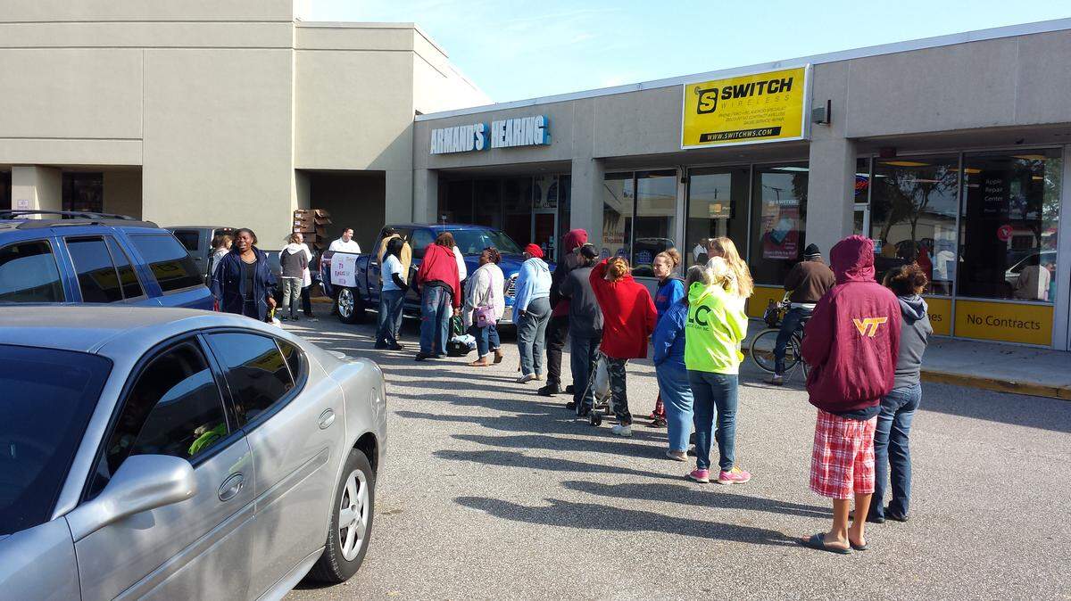 Needy people lined up for 200 free turkeys last year at Armand's Hearing Center, 4229 14th St. W., Bradenton. The owner of Armand's, Daniel Throneburg, says he will give away 400 turkeys this year during Armand's Second Annual Turkey Give Away from 9 a.m. to noon Saturday. 
 PROVIDED PHOTO