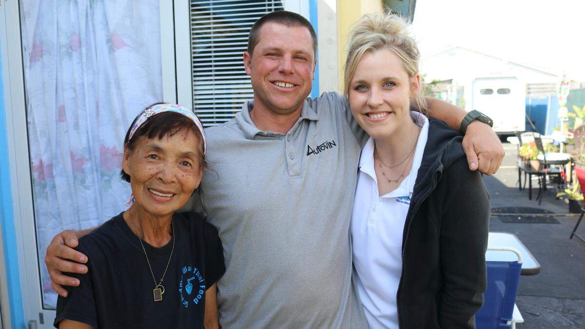 Grandma Wan poses with Jason Spence and Kathleen Barrett, who had just finished a meal of Pad Thai on March 9 at Grandma Wantani’s Thai Kitchen, 1128 30th Ave. W., Bradenton.