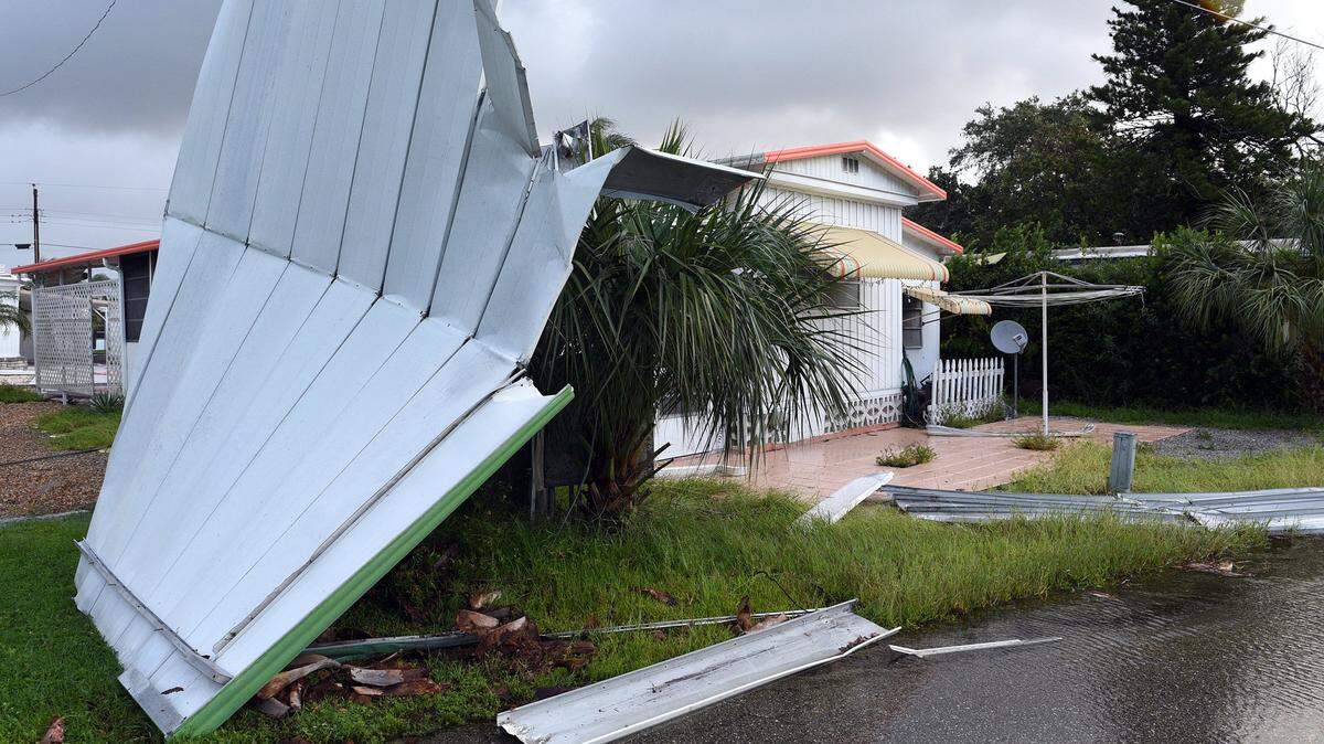 A mobile home suffered roof damage in the 6600 block of Cortez Road in Bradenton Monday morning in the aftermath of Hurricane Irma.