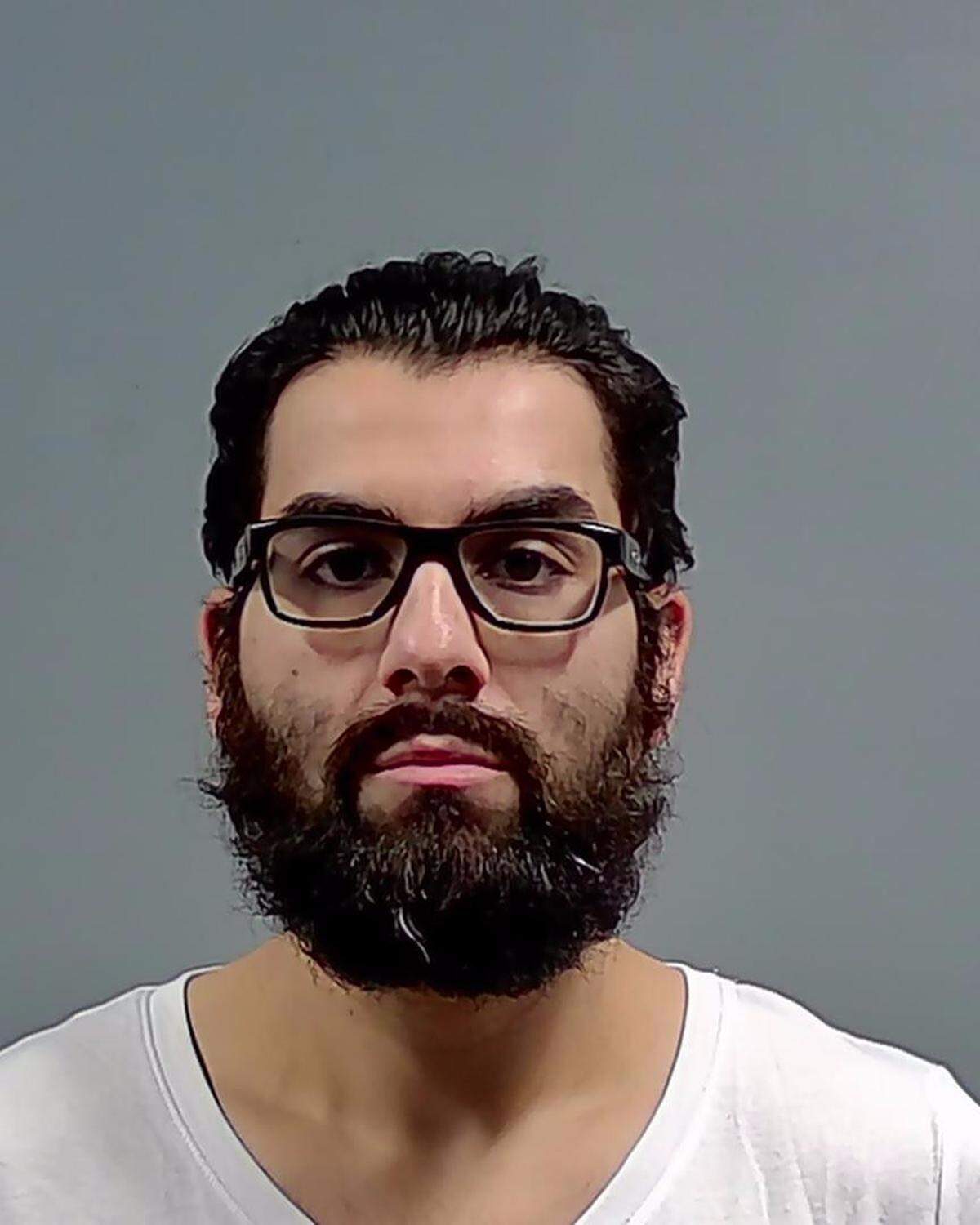 Mugshot of Sean Frank, 31, from Pompano Beach, who has been charged by the Bradenton Police Department for his role in a burglary in Manatee County. He is currently being held in Escambia County Jail.