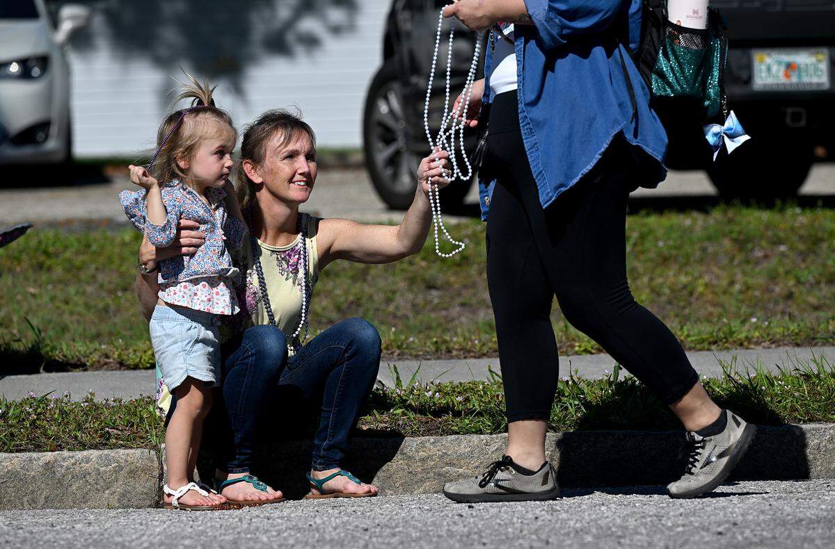 Beads are always the highlight for kids and adults at the Hernando De Soto Historical Society’s Children’s Parade.