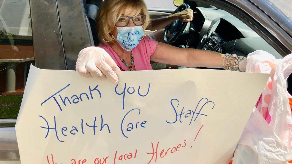 A parade participant brought thanks and a bag of cookies for health care workers Thursday at Lakewood Ranch Medical Center.
