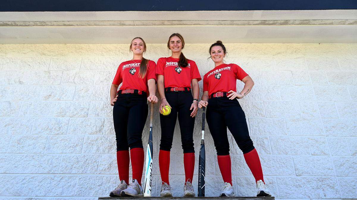 Avery Bouquin, 17, Jade Carnahan, 16, and Danika Best, 18, of Inspiration Academy’s softball team.