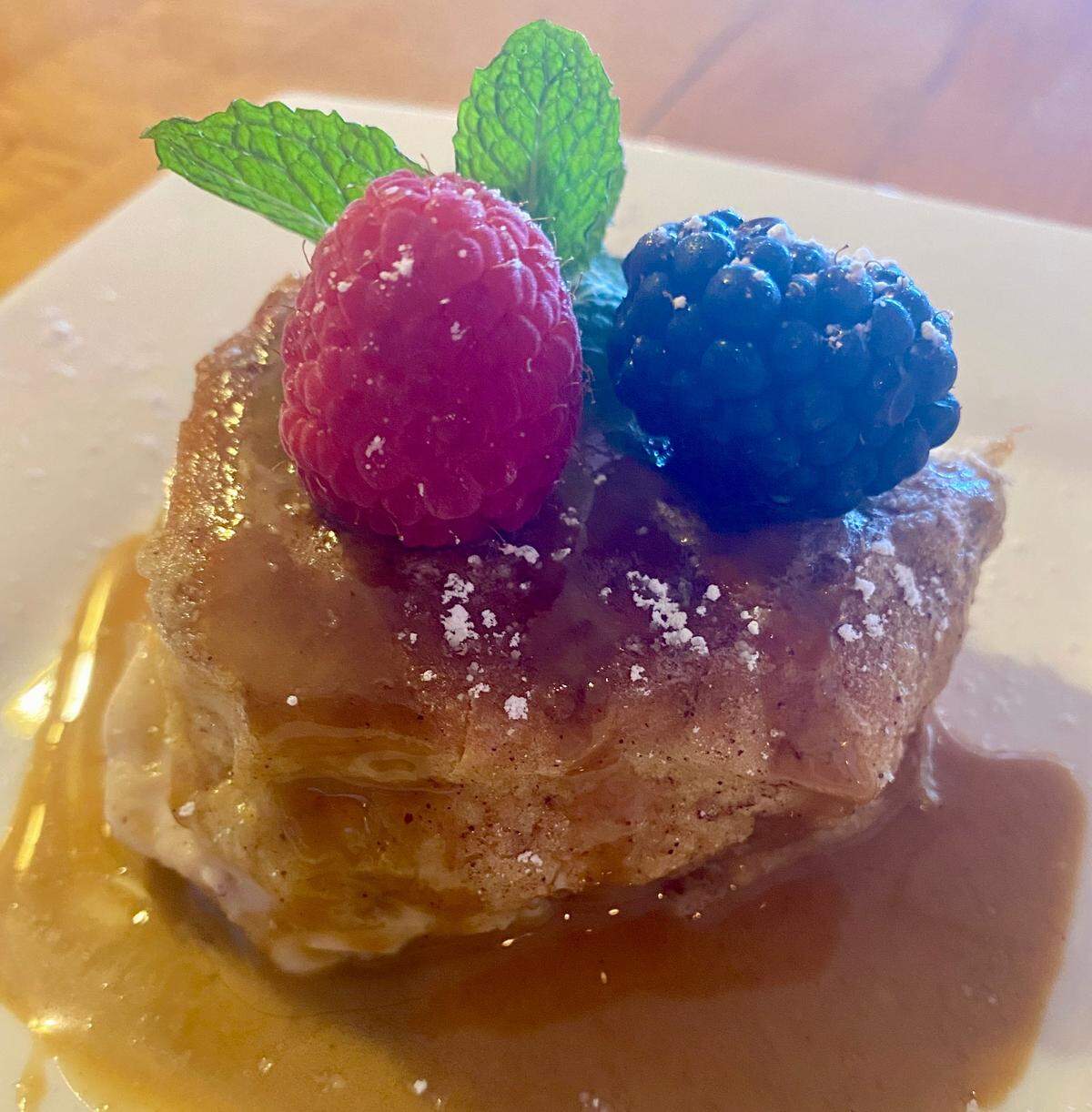 French Toast Squares stuffed with cream cheese, fresh raspberries and jam, is offered at Tahini Beach Cafe in Bradenton Beach. It is served with Tahini date syrup.
