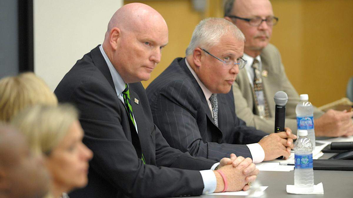 Carlos Beruff, at center at a meeting of the State College of Florida Board of Trustees, was elected to a second term as chairman of the Sarasota Manatee Airport Authority. Beruff's reforms have rankled faculty at the college.
 File photo:Bradenton Herald