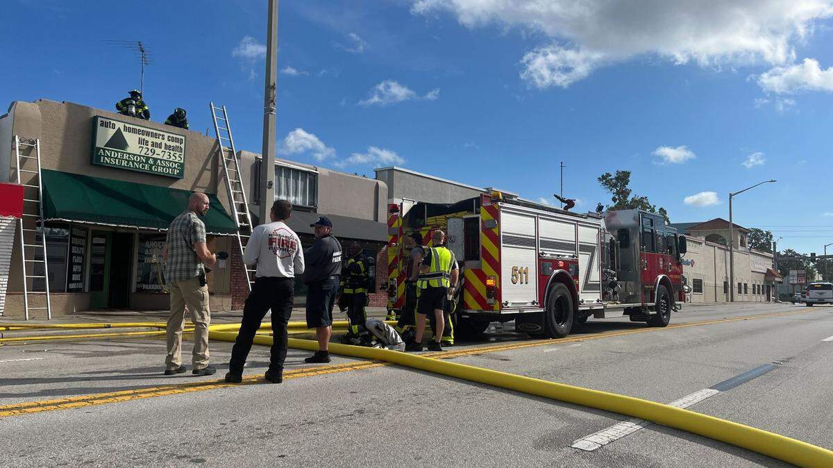 A fire started on the roof of Anderson & Associates Insurance Group in Palmetto on Wednesday afternoon. While crews worked to extinguish the fire, 8th Avenue was temporarily shut down.