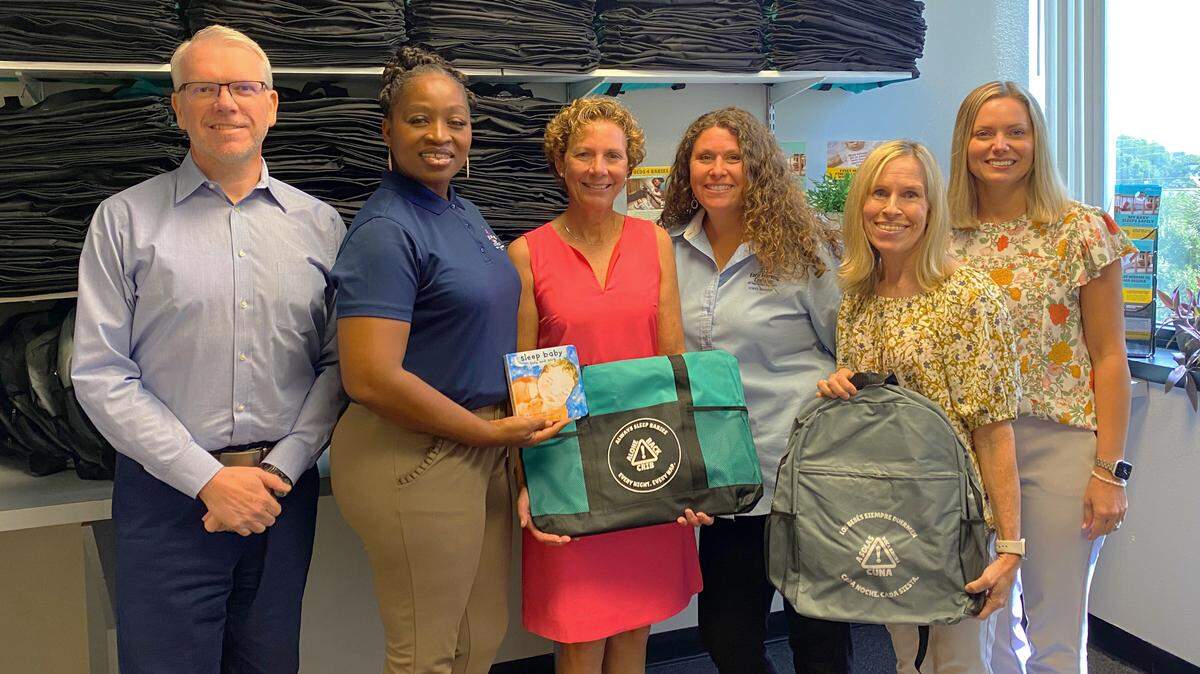 Manatee County and the Early Learning Coalition teamed up to launch a safe sleep program for parents. From left: Darrell King, Willona Milton, Connie Shingledecker, Rachel Spivey, Victoria Morgan and Kerry Gaylord.