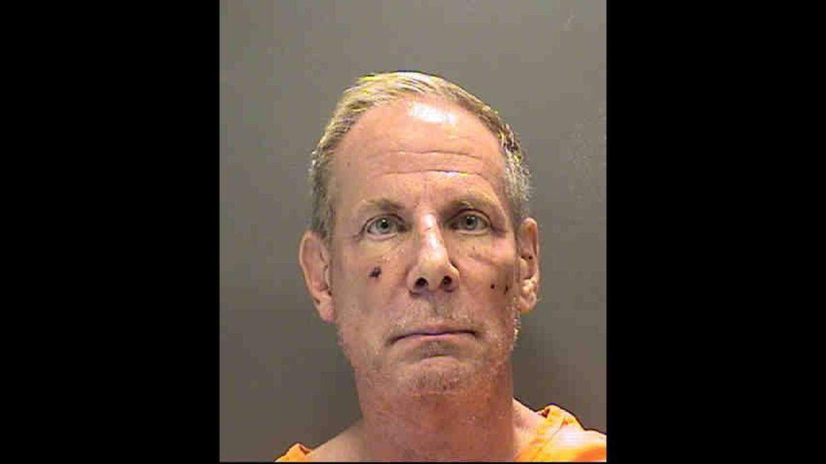 Thomas Dudenhoeffer, 69, was charged with two counts of shooting into a dwelling after deputies say he fired a 9mm handgun out of his house because of his "hallucinations."