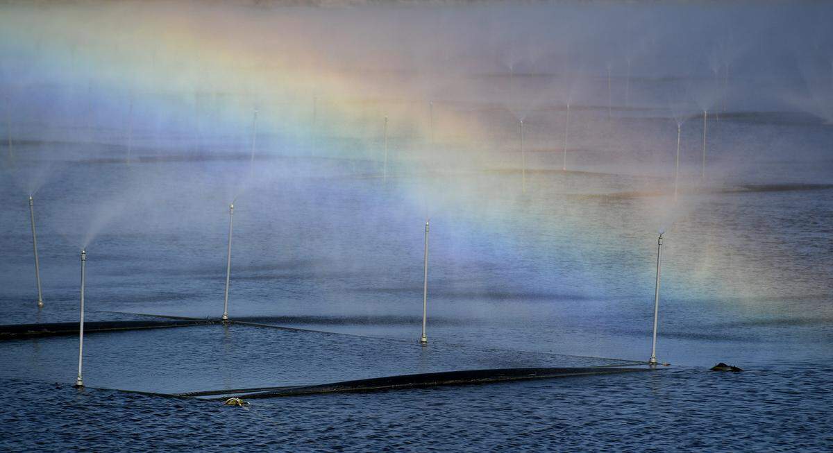 01/21/21--Aerators which help water evaporate from one of the nutrient-rich gypsum stacks at Piney Point throw a spray into the air as light catches the droplets. Manatee County’s biggest potential for environmental disaster has become a chief concern for local officials. The 676-acre site sits on the edge of Tampa Bay, holding nearly 800 million gallons of water created as a byproduct of phosphate mining.