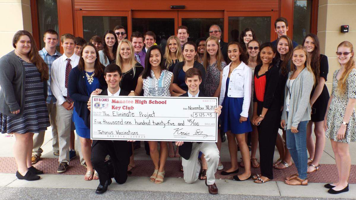 Members of the Key Club pose with the big check. The club recently raised more than $5,000 to help children and theirm others in third-world countries. PROVIDED PHOTO
