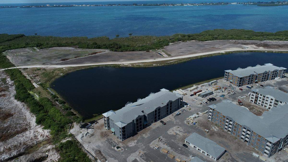 Local environmentalists raised concerns over mangrove trimming along Sarasota Bay where Aqua by the Bay and Cirrus Apartments at Aqua are under construction on El Conquistador Blvd. The loss of wetlands and continued development spurred an outcry from the public over changes to the master land use plan which would ease restrictions on construction.