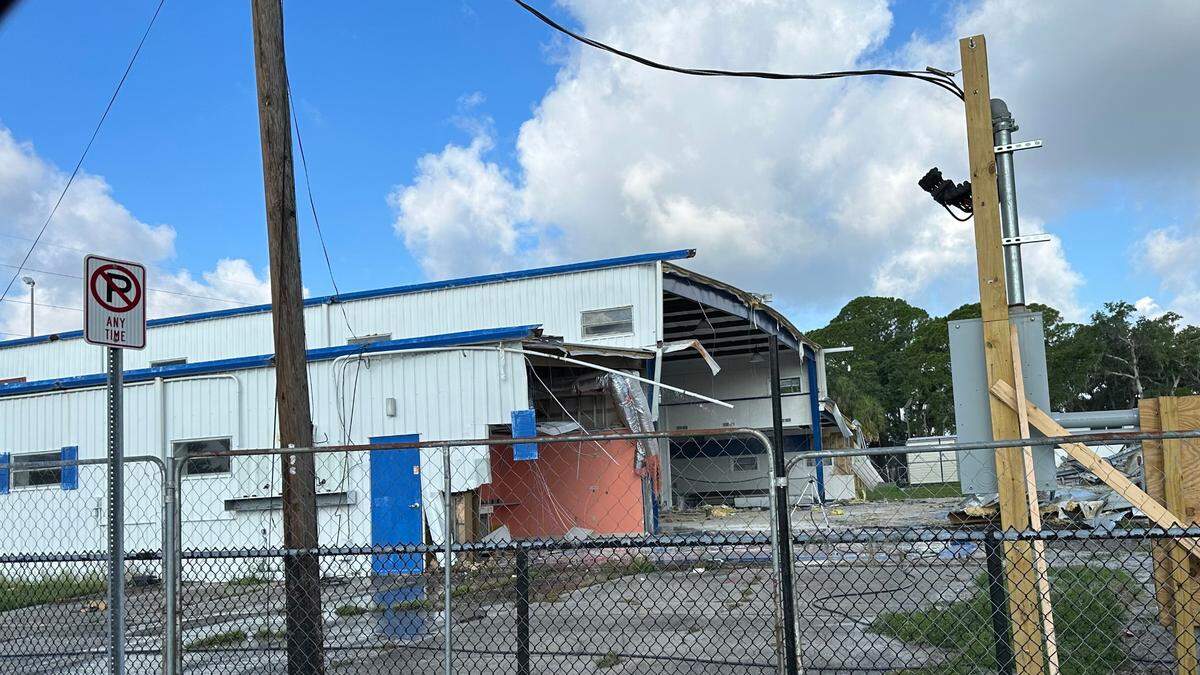 Demolition crews this week were dismantling the white metal structure with blue awnings that has been a neighborhood fixture at John H. Marble Park since the 1960s.