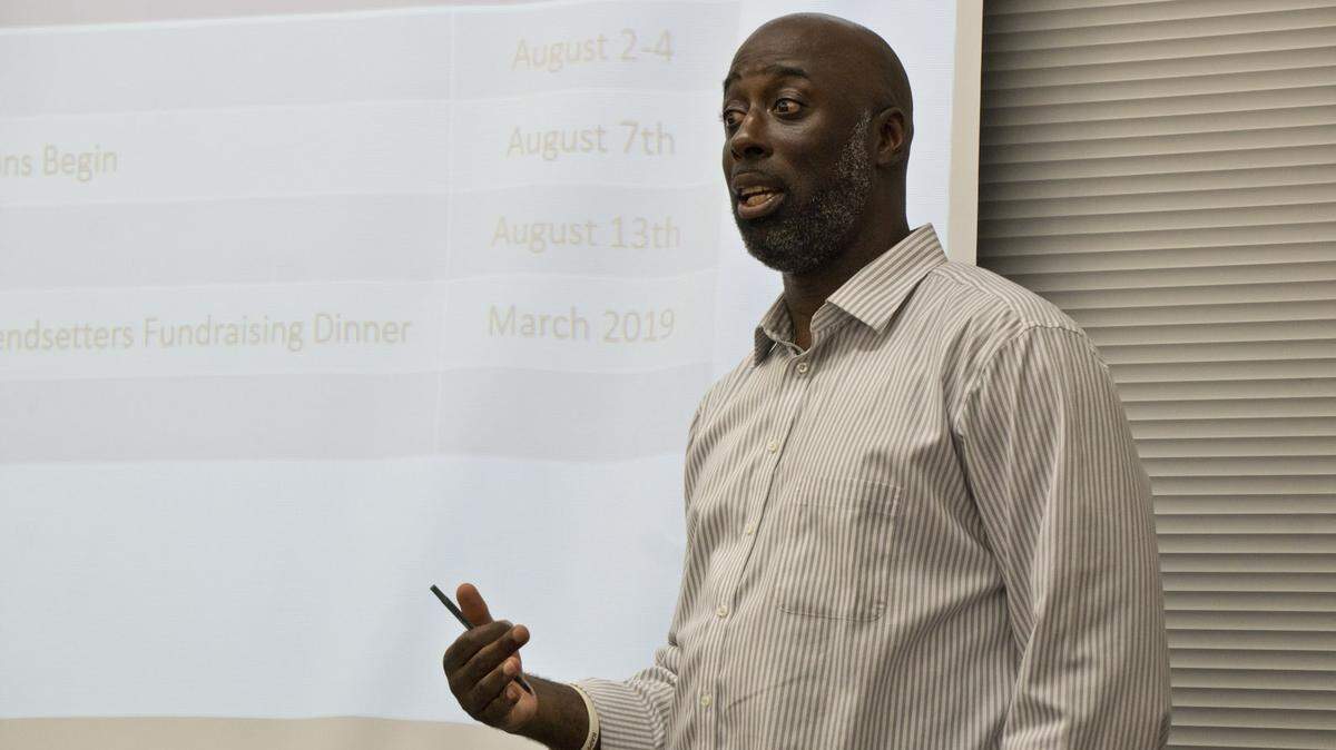 Eddie Hundley, principal of Lincoln Memorial Academy, addresses his board of directors at a meeting in July.