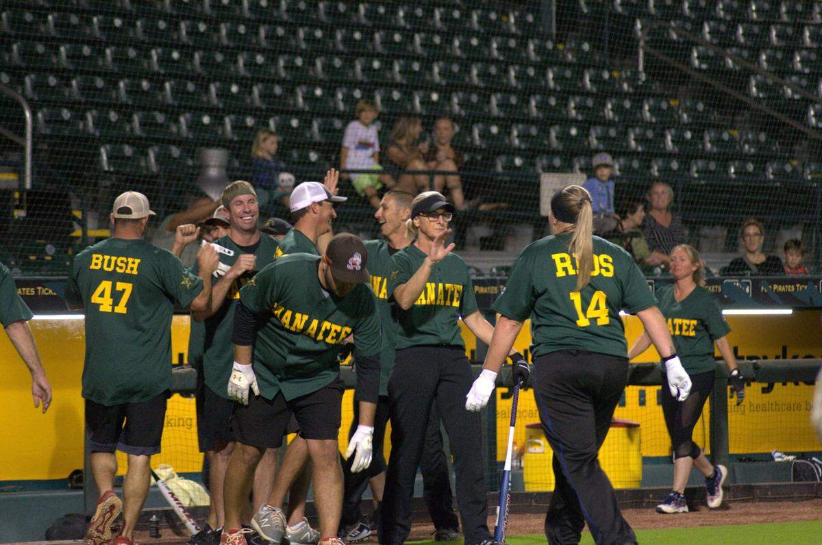 The Bradenton Police Department faced off against the Manatee County Sheriff’s Office in “Battle of the Badges,” a baseball match for charity at LECOM Park on Tuesday.
