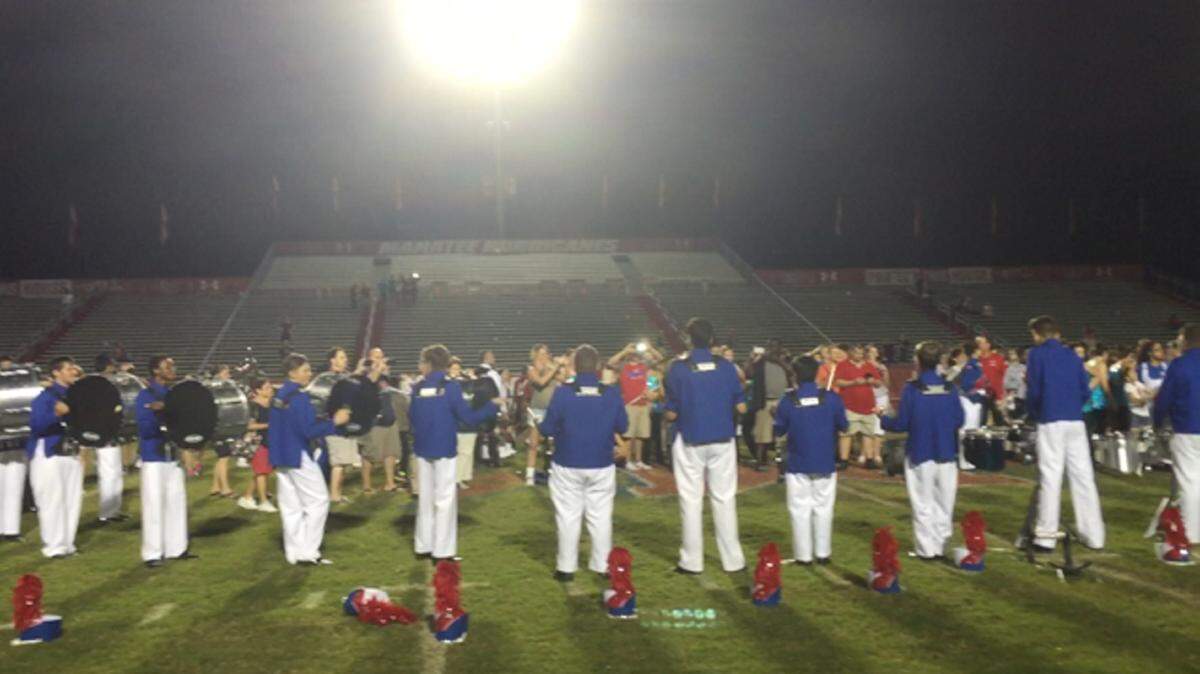 The Manatee High School Drum Line goes out to the field at Hawkins Stadium to celebrate after Saturday's Florida School Music Association District 11 Marching Band competition. The band scored straight Superior grades in the competitionLIZ JOHNSON/Special to the Herald