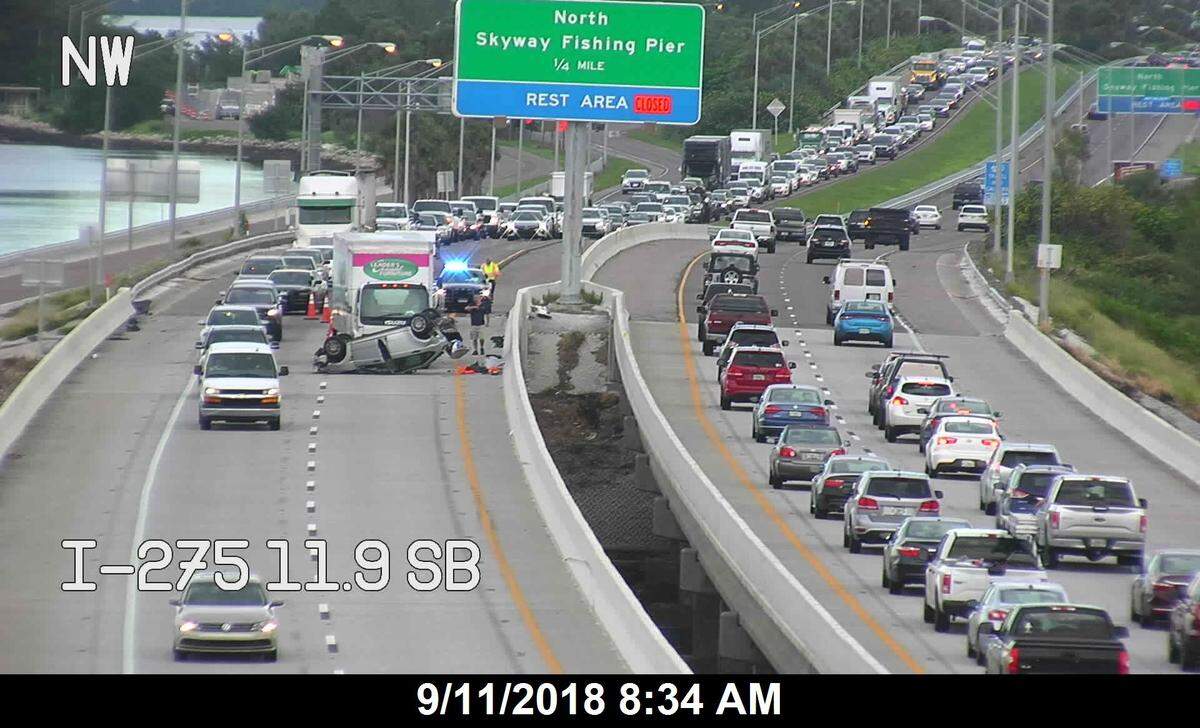 An overturned vehicle crash blocked one lane of the Sunshine Skyway Bridge early Tuesday morning.