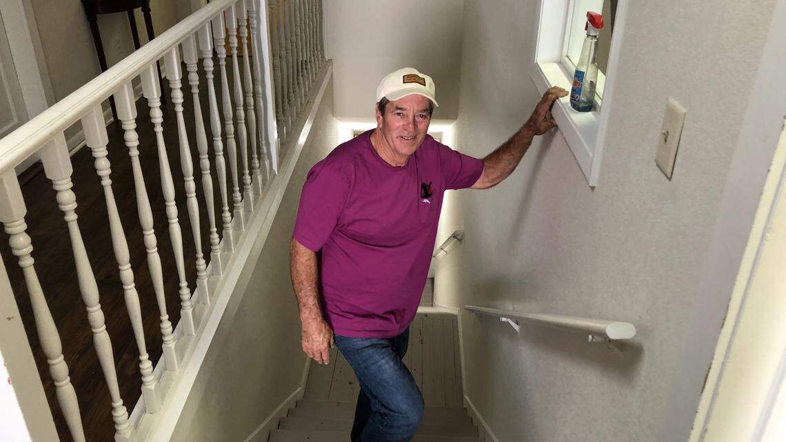 Chris Hayo stands on the stairs inside the Iron Block building, 528 12th St. W. The building is on the market for $1.1 million. During its more than 100-year history, the building has housed a candy store, a cigar shop, tailor shop, shoe repair business, legal offices and more. It is called Iron Block because of its decorative pressed metal facade.