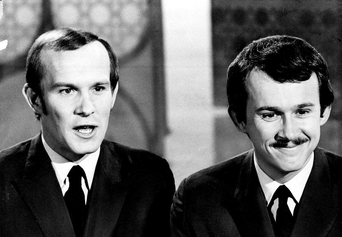 Tom, left, and Dick Smothers are shown in April 1969.