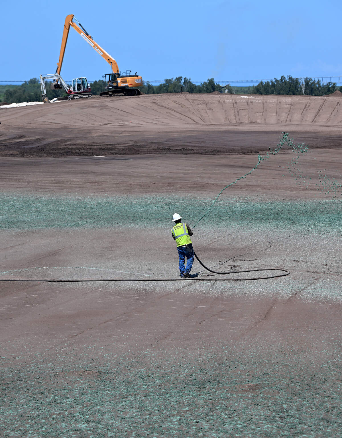 Site operators say they are making “amazing progress” at Piney Point, where the first pond is set to finally be closed by the end of July. More than 63 million gallons of contaminated water have also been drained into an underground injection control well. Texas Bermuda grass with a high salt tolerance is sprayed onto the Old Gypsum Stack South.
