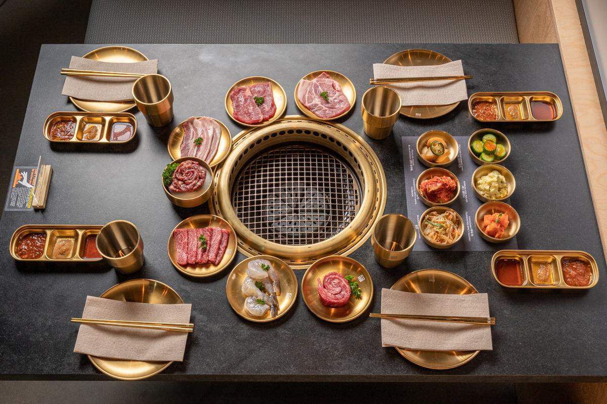 Guests grill their own food at Korê Steakhouse, 1561 Lakefront Drive, Suite 11, Lakewood Ranch.