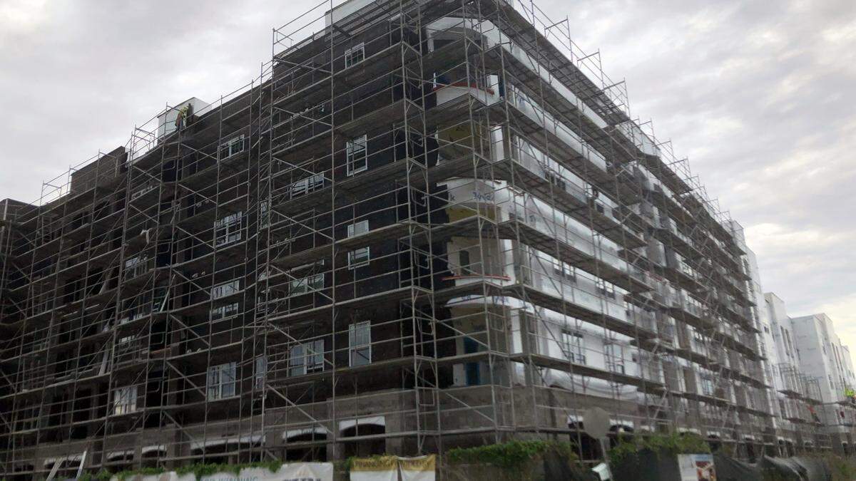 Construction underway on The Alloro at University Groves, a 55-plus luxury apartment building, on Oct. 19, 2022.