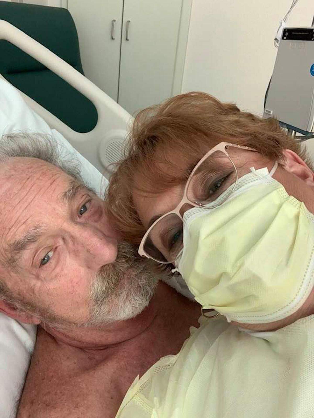John and Kim Paris at Manatee Memorial Hospital where he is being treated and is in isolation after being tested for the novel coroanvirus, COVID-19.