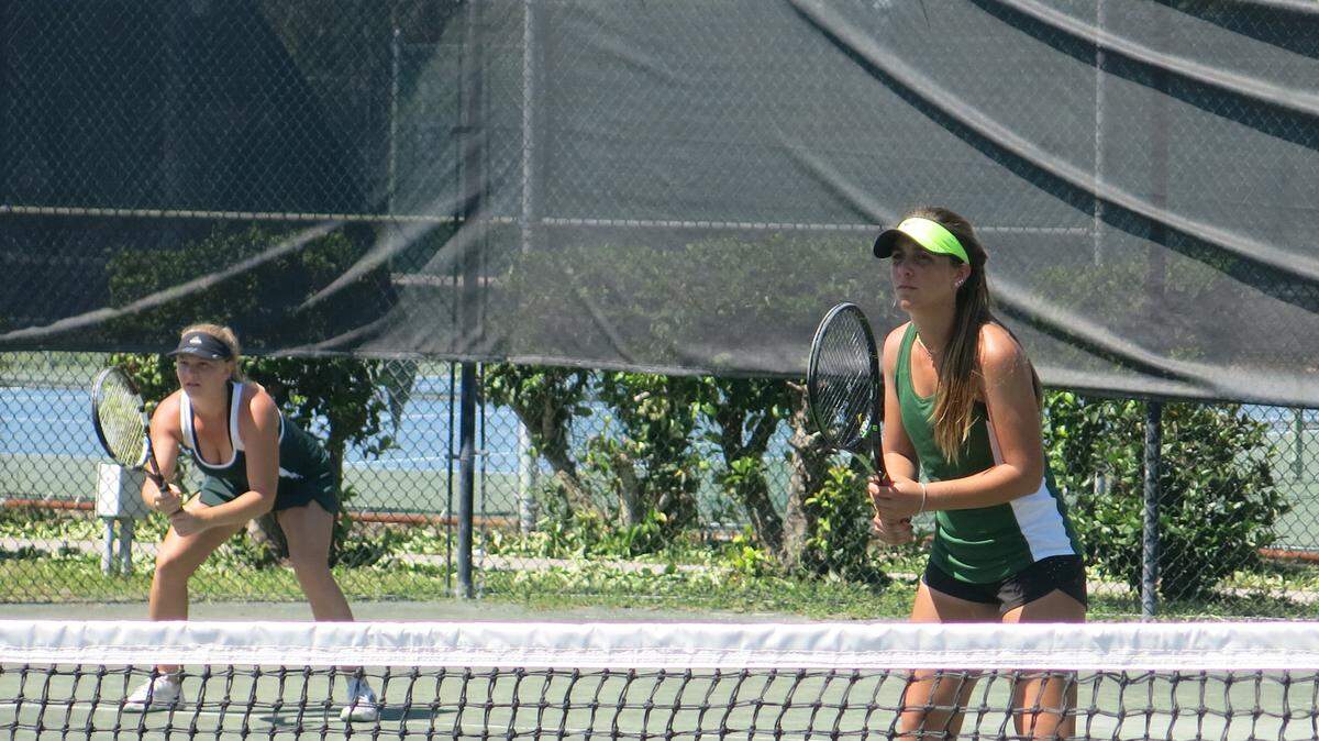 Jessie Groupa, right, and Gia Cohen of Lakewood Ranch compete in the No. 1 doubles final Thursday at the Class 4A-District 8 tournament in Sarasota. DAVID WILSON/Bradenton Herald