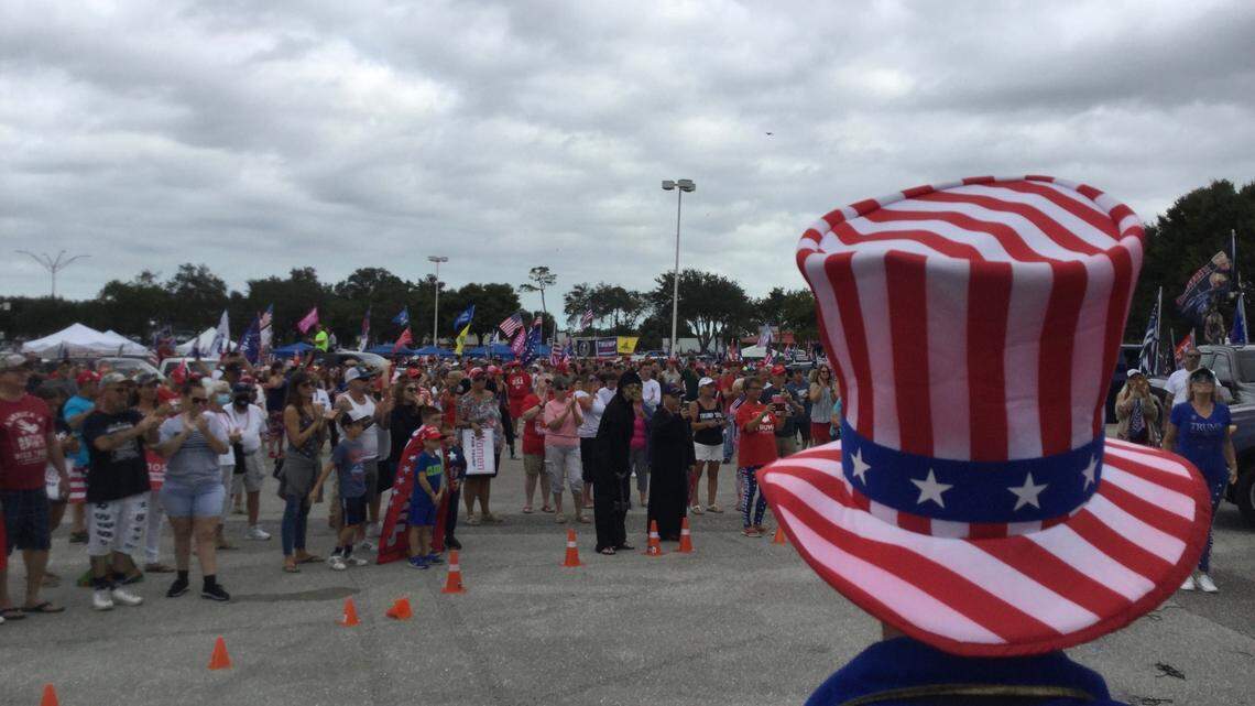 A man dressed as Uncle Sam told a cheering crowd, “No to socialism and yes to Donald Trump,” at Saturday’s massive Trump Train Manatee rally that drew thousands.