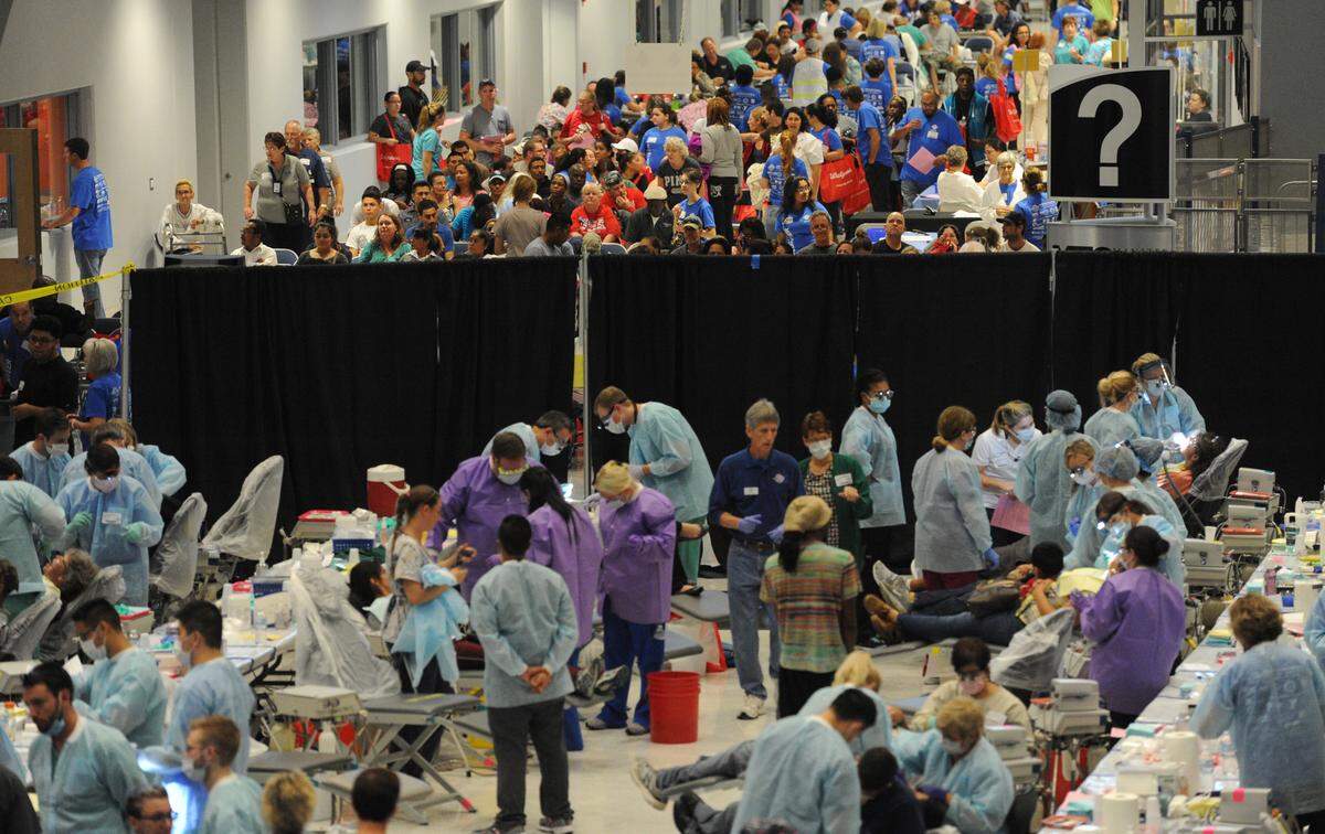 People wait for care at the Remote Area Medical event at Manatee Technical College, where free medical, dental and vision services were offered during the two-day event.